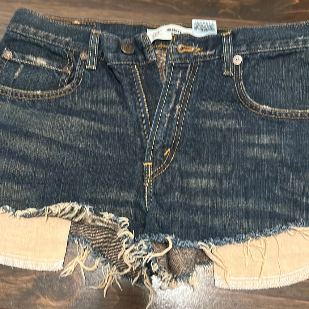 Levi shorts 514 slim straight distressed bottom. Size 29x29. Like new